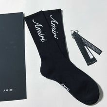 Load image into Gallery viewer, Amiri black and white script socks
