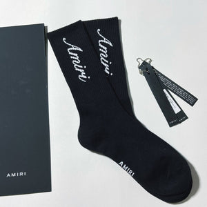 Amiri black and white script socks