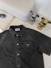 Load image into Gallery viewer, Prad denim badge short sleeve button down
