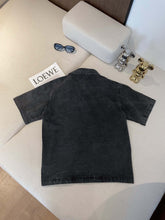 Load image into Gallery viewer, Prad denim badge short sleeve button down
