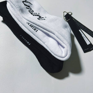 Amiri black and white script socks