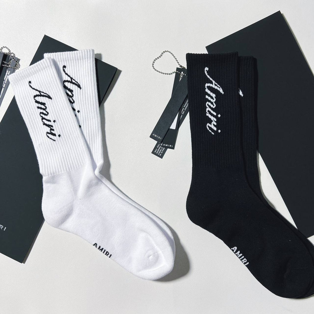 Amiri black and white script socks