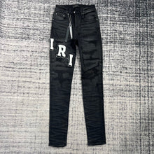 Load image into Gallery viewer, Amiri fuzzy letter denim
