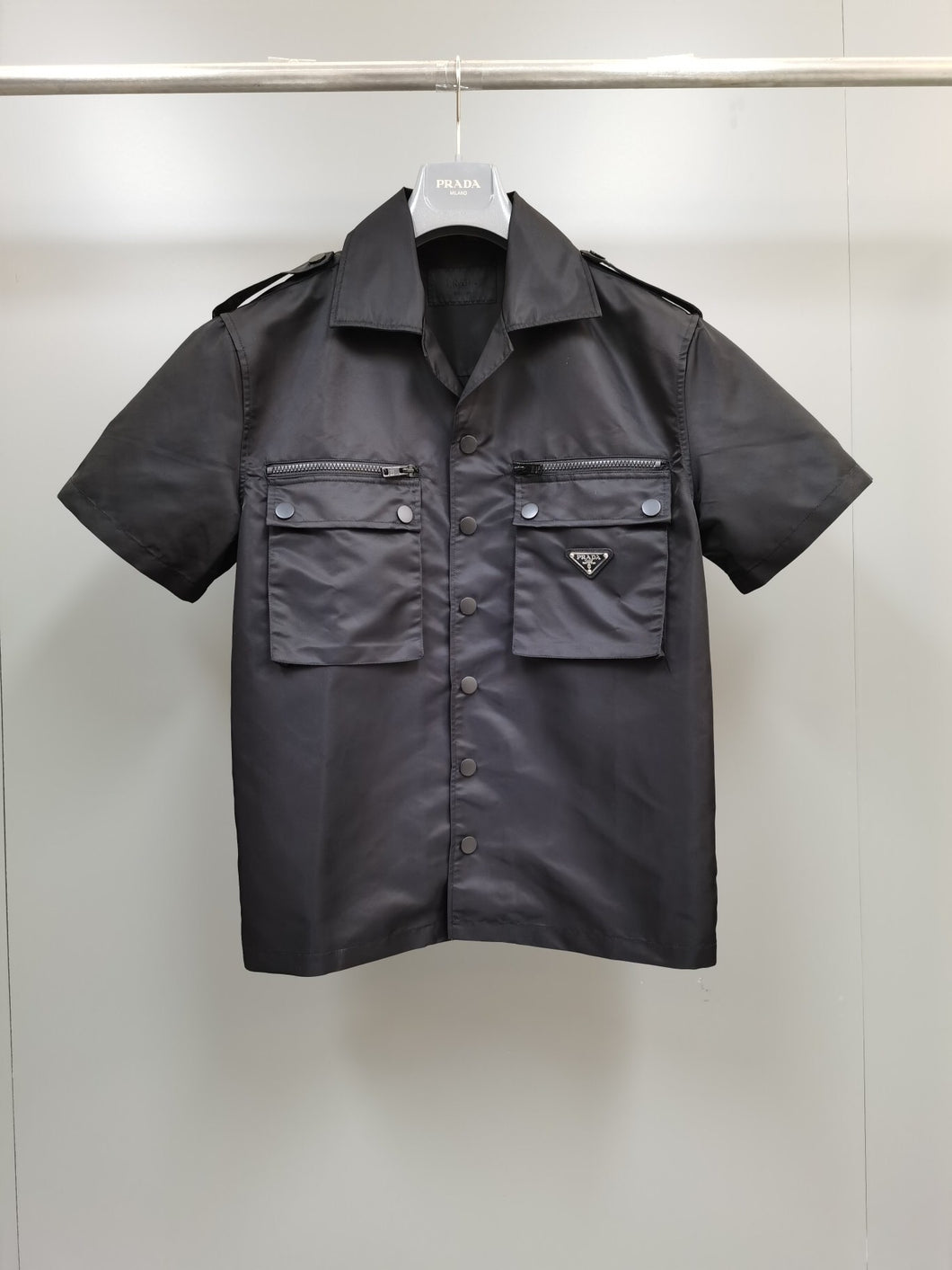 Prada pocket with zipper button down