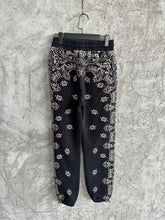 Load image into Gallery viewer, Amiri black paisely print joggers
