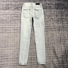 Load image into Gallery viewer, Amiri icy light denim
