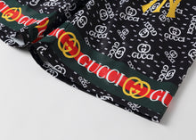 Load image into Gallery viewer, GG NY gold trunks
