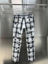 Load image into Gallery viewer, Givenchy distressed black and white stacked denim
