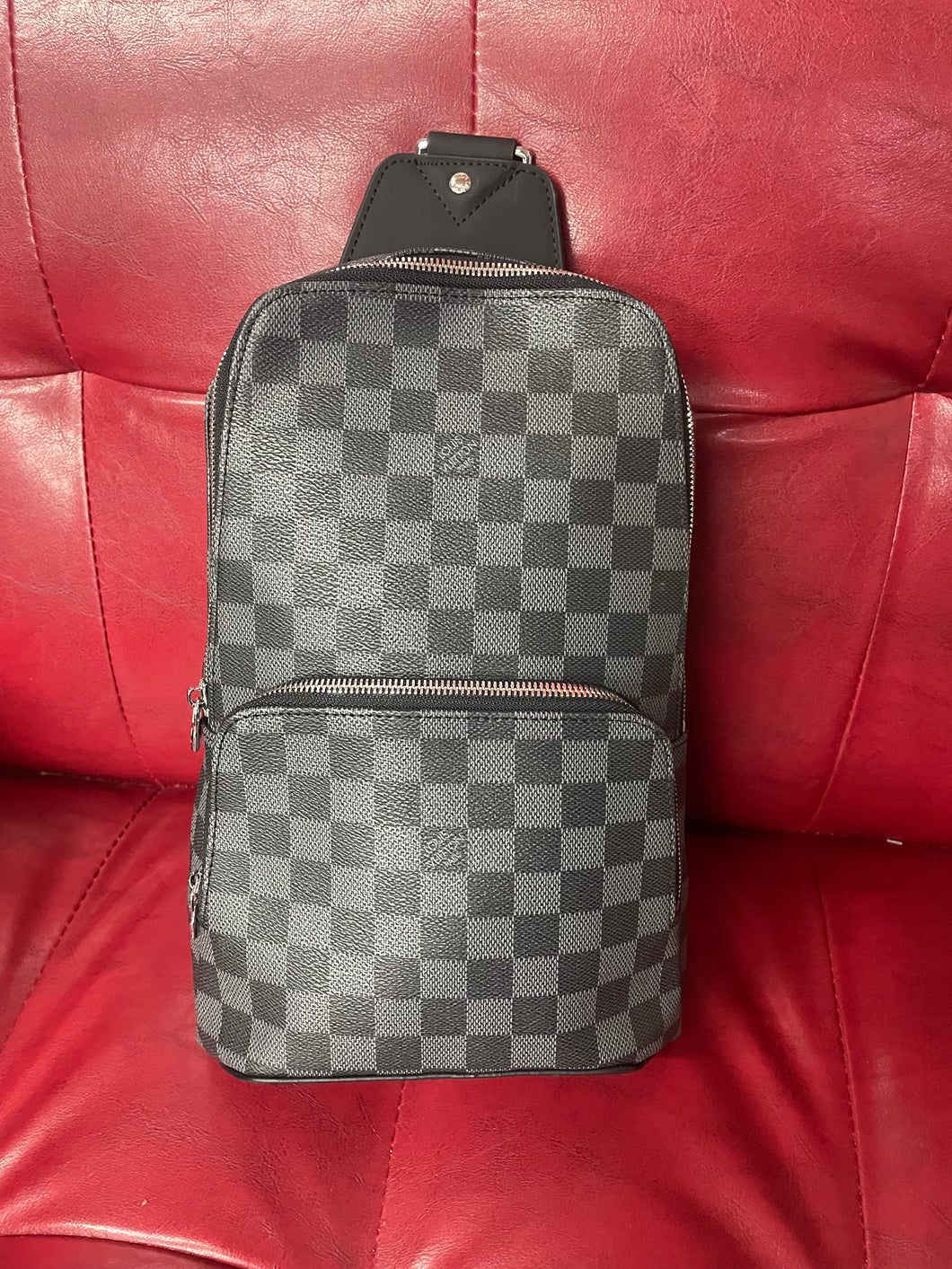 Mono gram sling bag